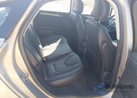 2015 Ford Fusion Energi Titanium from USA, damaged, VIN 3FA6P0SU7FR191324